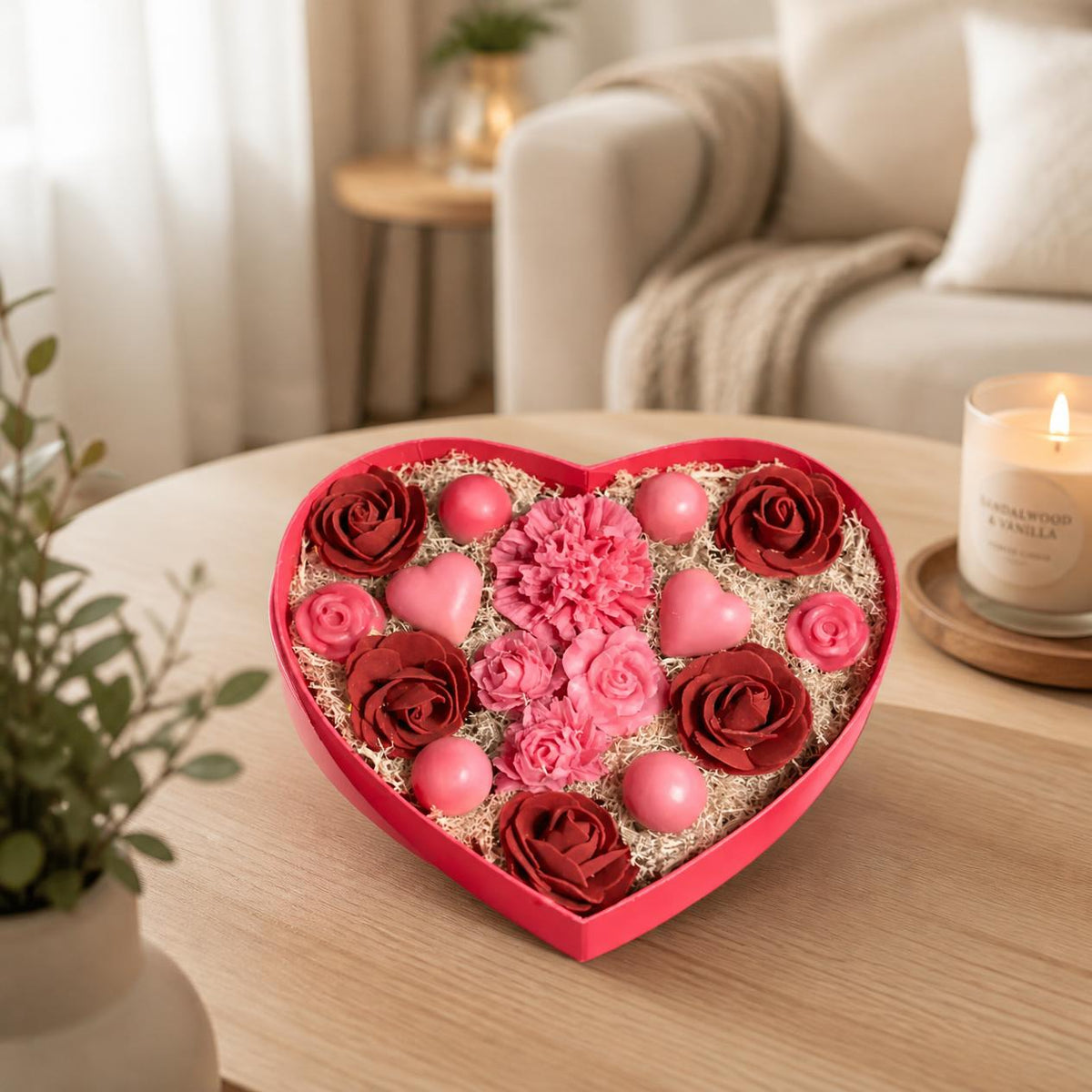 Coffret fondants Romantique rose pâle dans un salon